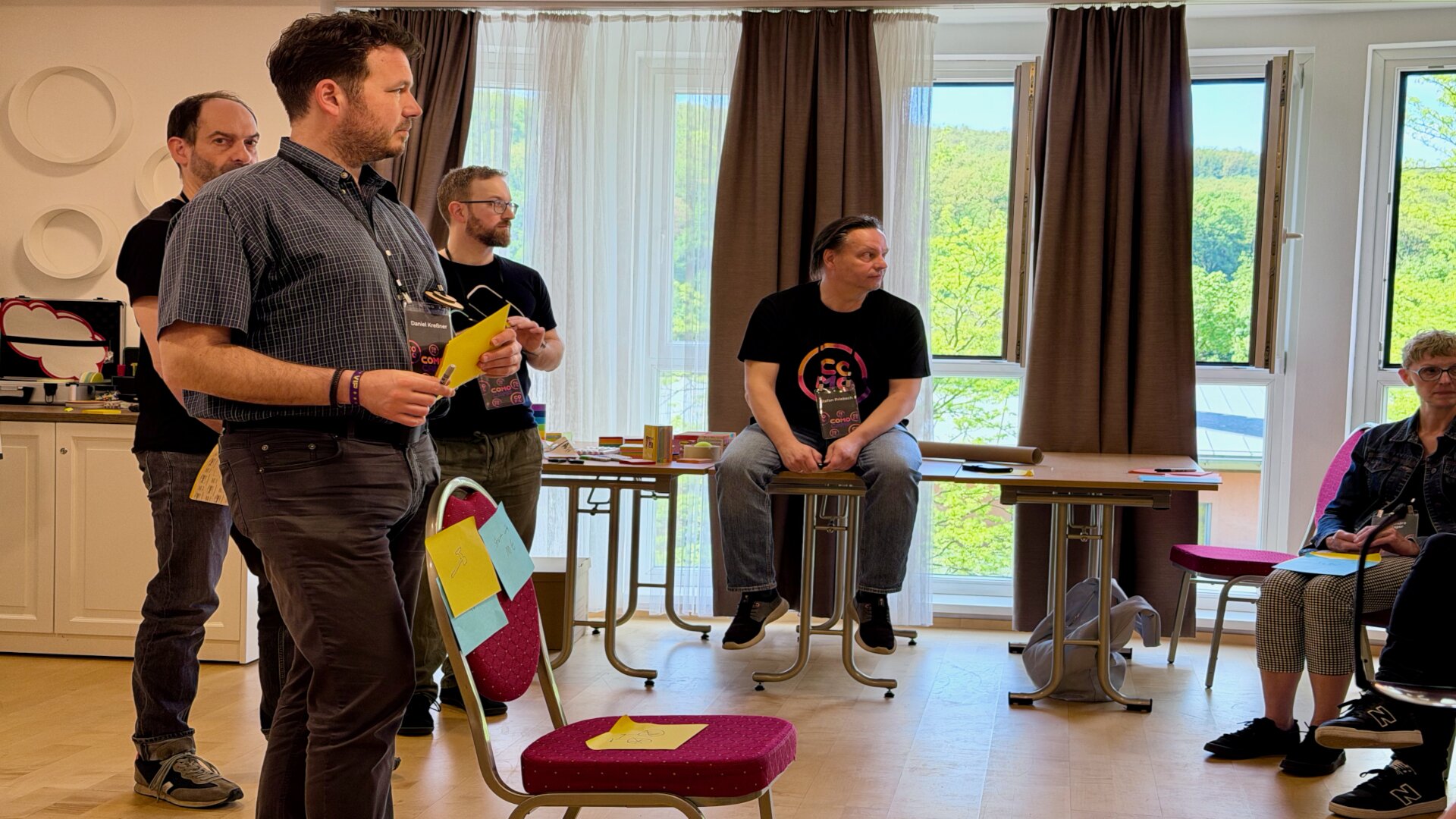 The participants of the Architectural Roleplay session re-enact the course of an auction.
