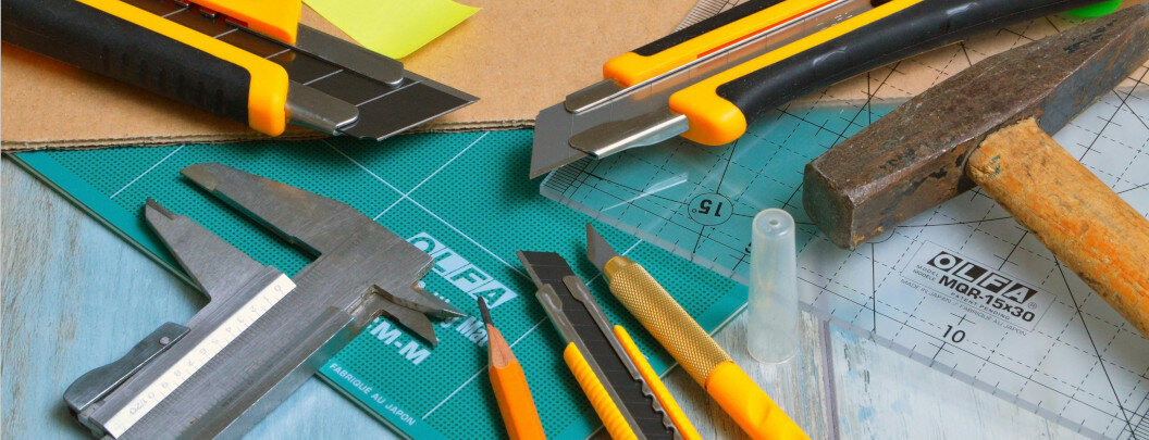 Workspace with various tools that are often used for precise manual work, model making or handicrafts